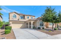 Charming two-story home with a two-car garage, landscaped front yard and an arched entryway at 2920 E Shady Spring Trl, Phoenix, AZ 85024