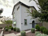 Charming two-story home featuring desert landscaping and a covered entry at 3930 S 58Th Ln, Phoenix, AZ 85043