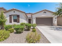One-story home with two-car garage and landscaped front yard at 22630 E Mewes Rd, Queen Creek, AZ 85142
