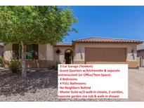 Beautiful single-story home featuring a three-car tandem garage and a low maintenance desert landscape at 19826 W Lincoln St, Buckeye, AZ 85326