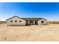 Charming home with a desert landscape and a classic-style exterior at 22750 E Roper Ln, Florence, AZ 85132