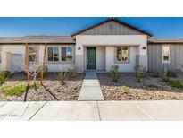 Charming single-story home with a well-manicured front yard and stylish architectural details at 4505 S Mole --, Mesa, AZ 85212