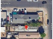 An aerial view of the property and surrounding neighborhood with street and address numbers visible at 1006 S 3Rd Ave, Phoenix, AZ 85003