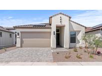 Charming single-Gathering home with a tile roof, desert landscaping, and a paved driveway, inviting curb appeal at 20306 W Turney Ave, Buckeye, AZ 85396