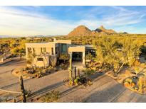 Luxury home with circular driveway and desert landscaping at 9701 E Happy Valley Rd # 10, Scottsdale, AZ 85255