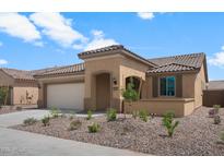 Charming single-story home with desert landscaping, neutral stucco, and a tile roof at 7691 W Cactus Wren Way, Florence, AZ 85132