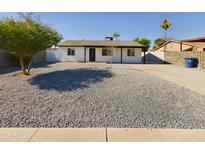 Newly renovated home with rock landscaping and driveway at 4020 S Wendler Dr, Tempe, AZ 85282