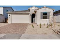 Charming single-Gathering home featuring a two-car garage and xeriscaping at 25206 N 172Nd Ln, Surprise, AZ 85387