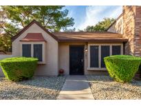 Charming single-story home with well-maintained landscaping and a welcoming entryway at 8111 W Wacker Rd # 121, Peoria, AZ 85381