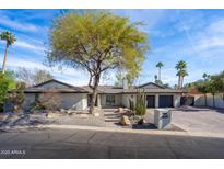 Stunning single-story home with modern design and desert landscaping at 5919 N 45Th St, Phoenix, AZ 85018