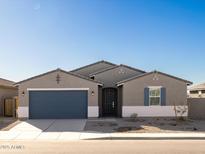 New single story home with a two car garage at 36913 W La Paz St, Maricopa, AZ 85138