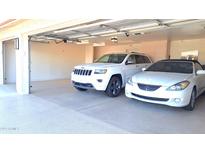 Spacious two-car garage with ample space for parking and storage at 8053 E Natal Ave, Mesa, AZ 85209