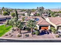 Luxury home with solar panels, desert landscaping, and a spacious backyard at 23228 N Gaviota Dr, Sun City West, AZ 85375