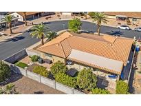 Beautiful single-story home featuring well-maintained landscaping, a privacy wall, and a tile roof at 4019 E Calypso Ave, Mesa, AZ 85206