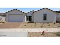 Charming one-story home with neutral exterior, well-kept landscape, and paved driveway at 25137 N 171St Ave, Surprise, AZ 85387