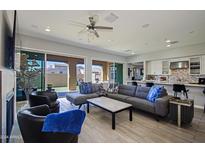 Spacious living room with sliding doors to backyard at 7325 E Conquistadores Dr, Scottsdale, AZ 85255