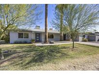 Charming single story home with landscaped lawn and driveway at 4555 N 5Th Ave, Phoenix, AZ 85013