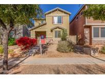 Two-story house with red door and landscaping at 4354 E Rosemonte Dr, Phoenix, AZ 85050