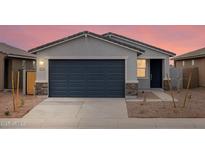 Charming single-Gathering home featuring a two-car garage and neutral colored exterior at 3175 E Hayden Rose Ave, San Tan Valley, AZ 85143