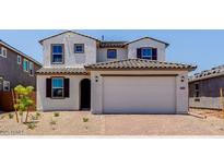Charming two-story home with a two car garage and beautifully tiled roof at 25238 N 172Nd Ln, Surprise, AZ 85378