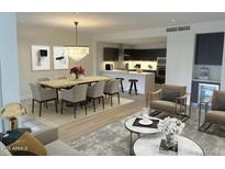 Open-concept living room with a dining area, sleek kitchen, and comfortable seating arrangements at 4739 N Scottsdale Rd # 2002, Scottsdale, AZ 85251
