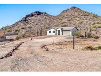 Single story home with attached garage and mountain views at 27112 N 148Th Dr, Surprise, AZ 85387