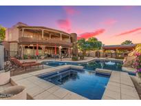 Luxury estate with inviting pool and spa, perfect for relaxation and entertaining at 2632 E Camina Plata --, Gilbert, AZ 85298