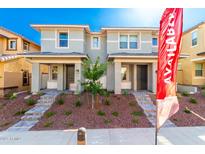 New two-story townhomes featuring covered entry, professional landscaping, and available signage at 2848 N Evergreen St, Buckeye, AZ 85396