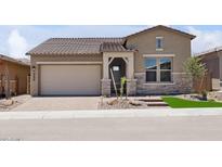 Charming single-Gathering home featuring desert landscaping, a two-car garage, and a welcoming entrance at 32962 N 131St Dr, Peoria, AZ 85383