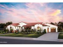 Stunning Spanish-style home with red tile roof, landscaping, and a 2-car garage at 6621 E Doubletree Ranch Rd, Paradise Valley, AZ 85253