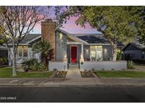 Gray house with red door, brick walkway, and landscaping at 14 E 14Th St, Tempe, AZ 85281