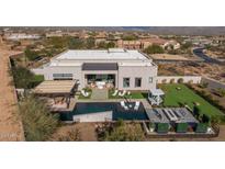 Aerial view of a luxurious home with a pool and expansive backyard at 17213 E Morning Vista Ct, Rio Verde, AZ 85263