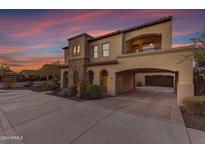 Two-story home with stone accents and a covered garage at 2322 E Samantha Way, Phoenix, AZ 85042