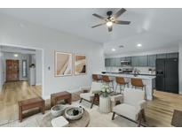 Bright, open-concept living room and kitchen featuring modern finishes and ample seating at 1337 N Rosemont --, Mesa, AZ 85205