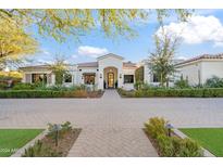 Stunning curb appeal featuring a white two-story home with a brick walkway at 6229 E Gold Dust Ave, Paradise Valley, AZ 85253