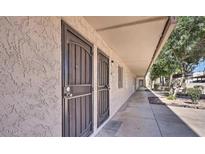 Exterior view of condo building showcasing building facade and walkway at 7625 E Camelback Rd # B116, Scottsdale, AZ 85251