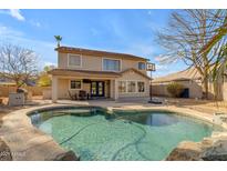 Relaxing backyard oasis with a sparkling pool and patio at 22821 S 212Th St, Queen Creek, AZ 85142