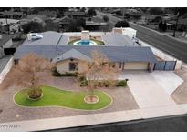 Aerial view of a single-Gathering home with a pool and landscaped yard at 755 W 2Nd St, Mesa, AZ 85201