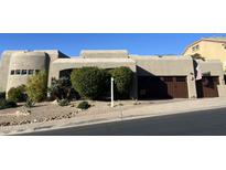 Stunning stucco home with a 3-car garage and beautifully landscaped grounds at 12646 N 17Th Pl, Phoenix, AZ 85022