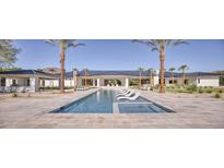 Stunning backyard featuring a modern pool, sun loungers, and well-manicured landscaping at 6215 N Casa Blanca Dr, Paradise Valley, AZ 85253