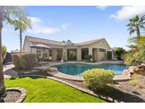 Spacious backyard with a pool and patio area at 3290 E Cherrywood Pl, Chandler, AZ 85249
