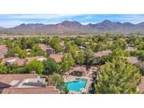 Aerial view of community pool and surrounding buildings at 15050 N Thompson Peak Pkwy # 2006, Scottsdale, AZ 85260