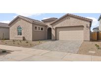 Charming single-story home with a neutral color scheme, desert landscaping, and a two-car garage at 22536 E San Tan Blvd, Queen Creek, AZ 85142