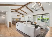 Open concept living and kitchen area with exposed beams at 4424 N 38Th St, Phoenix, AZ 85018
