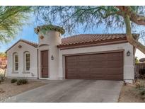 Single-story house with attractive curb appeal and a two-car garage at 2133 E La Salle St, Phoenix, AZ 85040