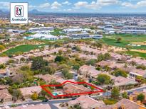 Aerial view of single-Gathering home with pool, situated in a community near TPC Scottsdale at 7710 E Monica Dr, Scottsdale, AZ 85255