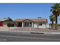 Charming single-story home featuring a cozy covered porch, low-maintenance landscaping and a welcoming entrance at 5255 S Mill Ave, Tempe, AZ 85283