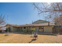 House with a fire pit and spacious yard at 10407 W Catalina Dr, Avondale, AZ 85392