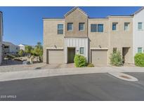 Modern two-story townhome with two-car garage and landscaped front at 8184 N 22Nd Dr, Phoenix, AZ 85021