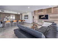 Open living space with modern furniture and city views at 7120 E Kierland Blvd # 307, Scottsdale, AZ 85254